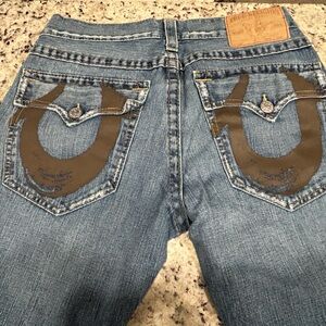 True Religion blue jeans.  Size 34.  See measurements in photos.